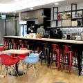 Property Guru - Paya Lebar Quarter | Product Seen: [Gum – PP + Tower Arm chair, Customised laminated table top + Cosson Table Base, Plug + Square Leg Side Chair, Chimo Pouf / Ottoman – Medium & Alex Barchair – Mid Back]